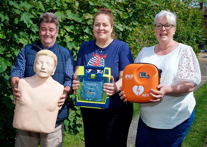 Steve Taylor, Gill Cleeve and Jo Carroll with the new defibrillator Winchcombe Farm, Gill Cleeve, CPR