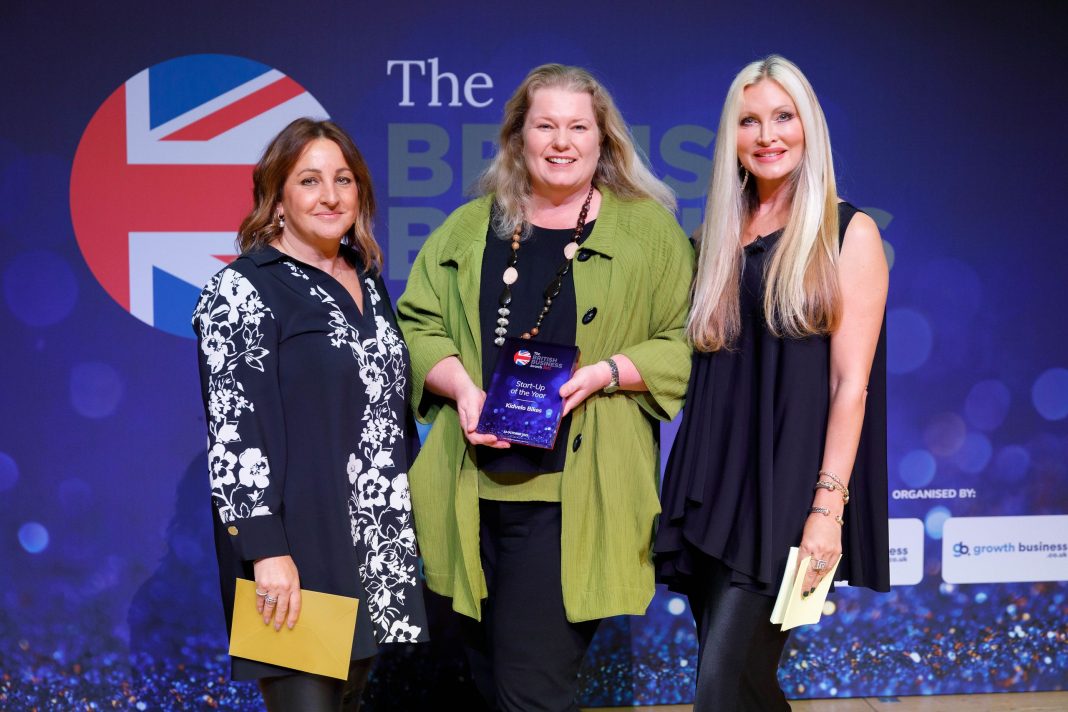 Karen Woods pictured at British Business Awards with Bex Barnett, of Medium Segment Marketing Sage and host Caprice Bourett, model and businesswoman. Photo by BBA Kidvelo balance bikes, Leamington