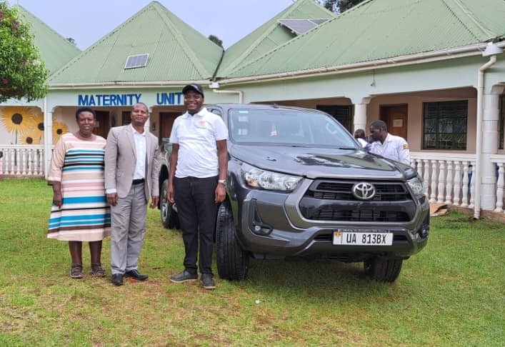 Potters Village staff with the new truck Potters Village, Uganda, Solihull Rotary Club