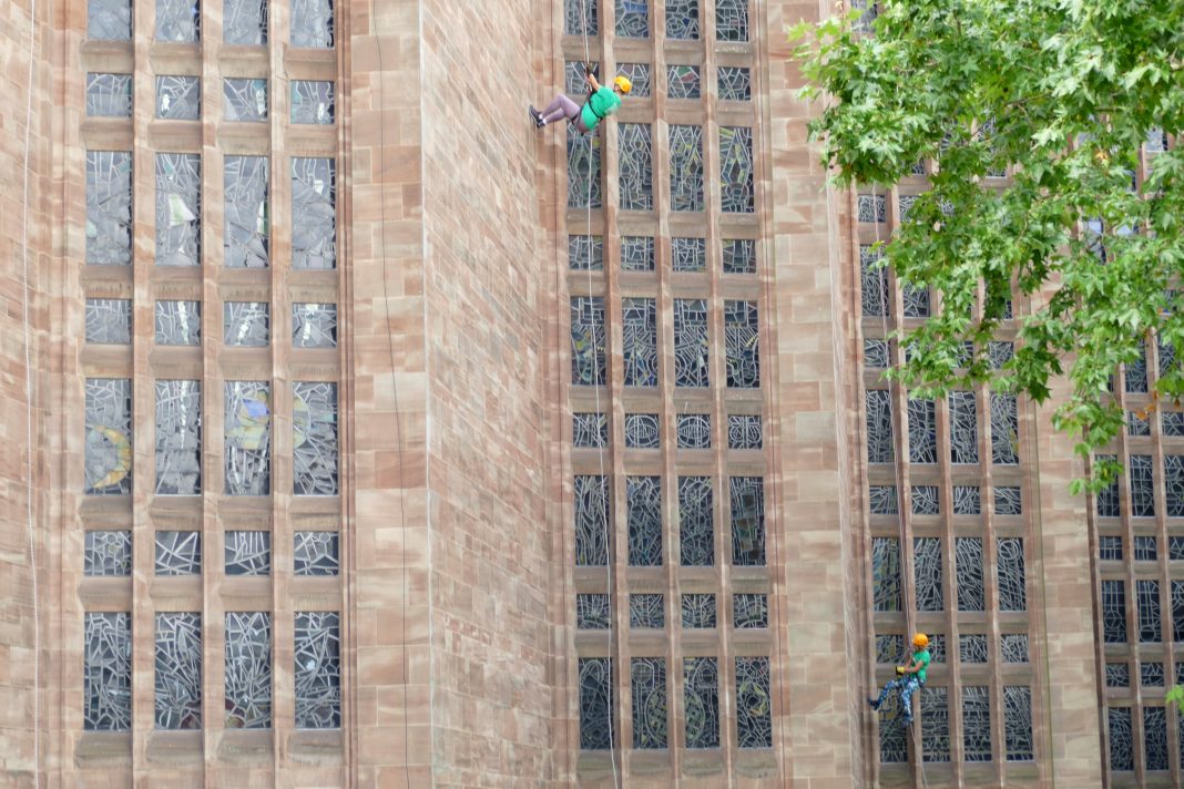 A fundraiser descends Coventry Cathedral last year